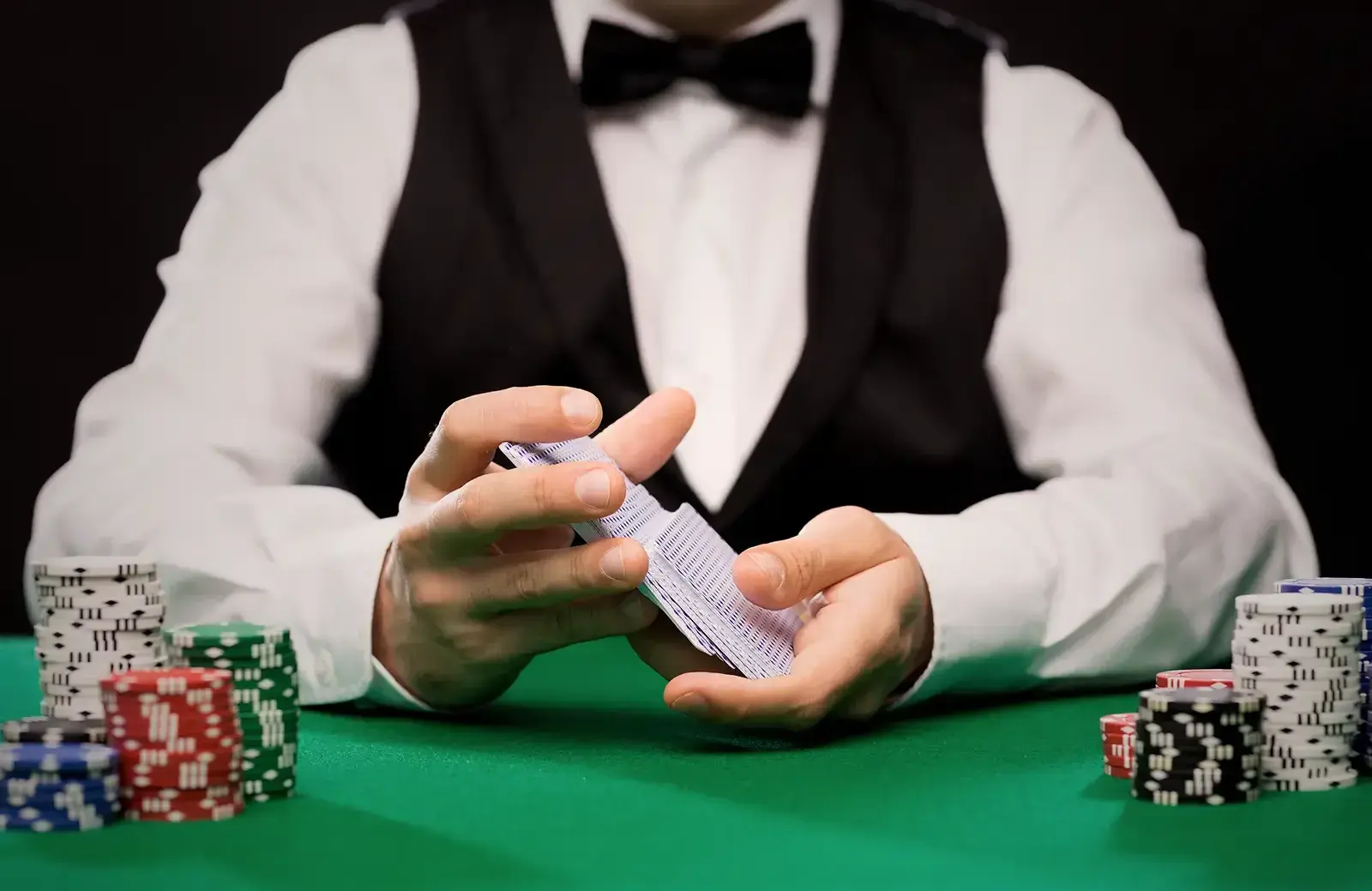 Casino Dealer in formal vest
