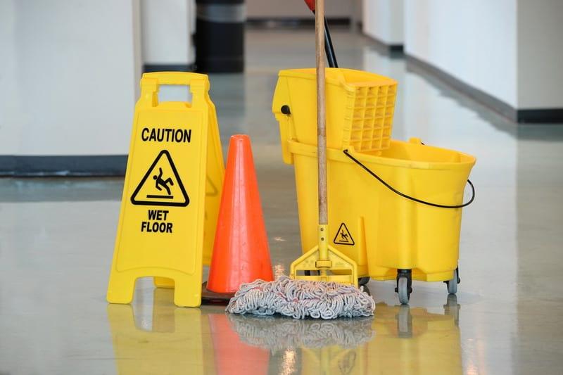 wet mop with caution sign