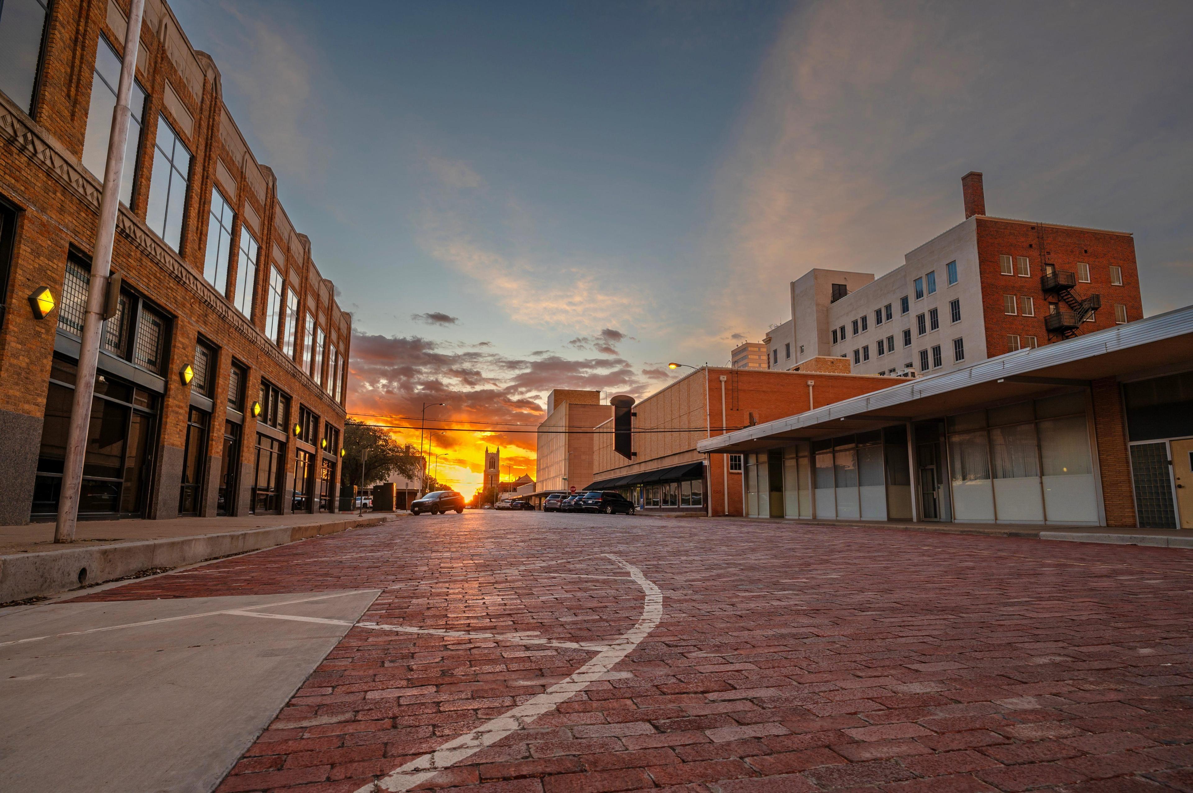 This is a hero image showing the exterior of the Alsco Uniforms location.