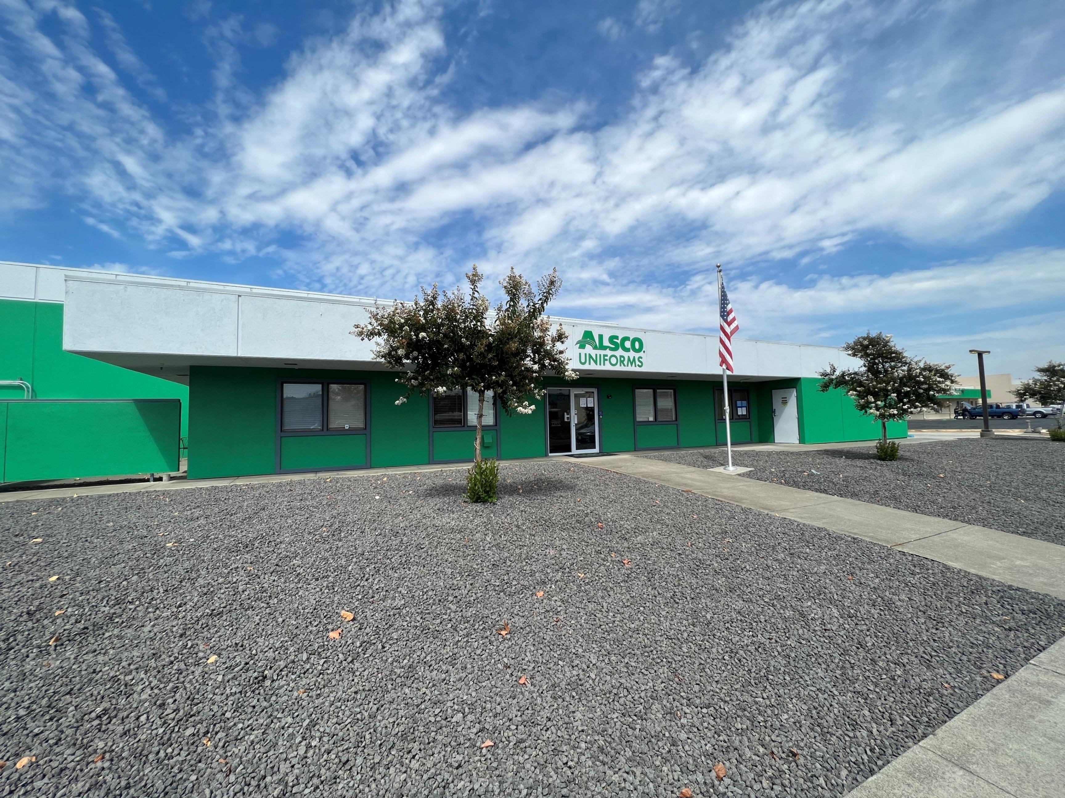 This is a photo of the exterior of the Alsco Uniforms location.