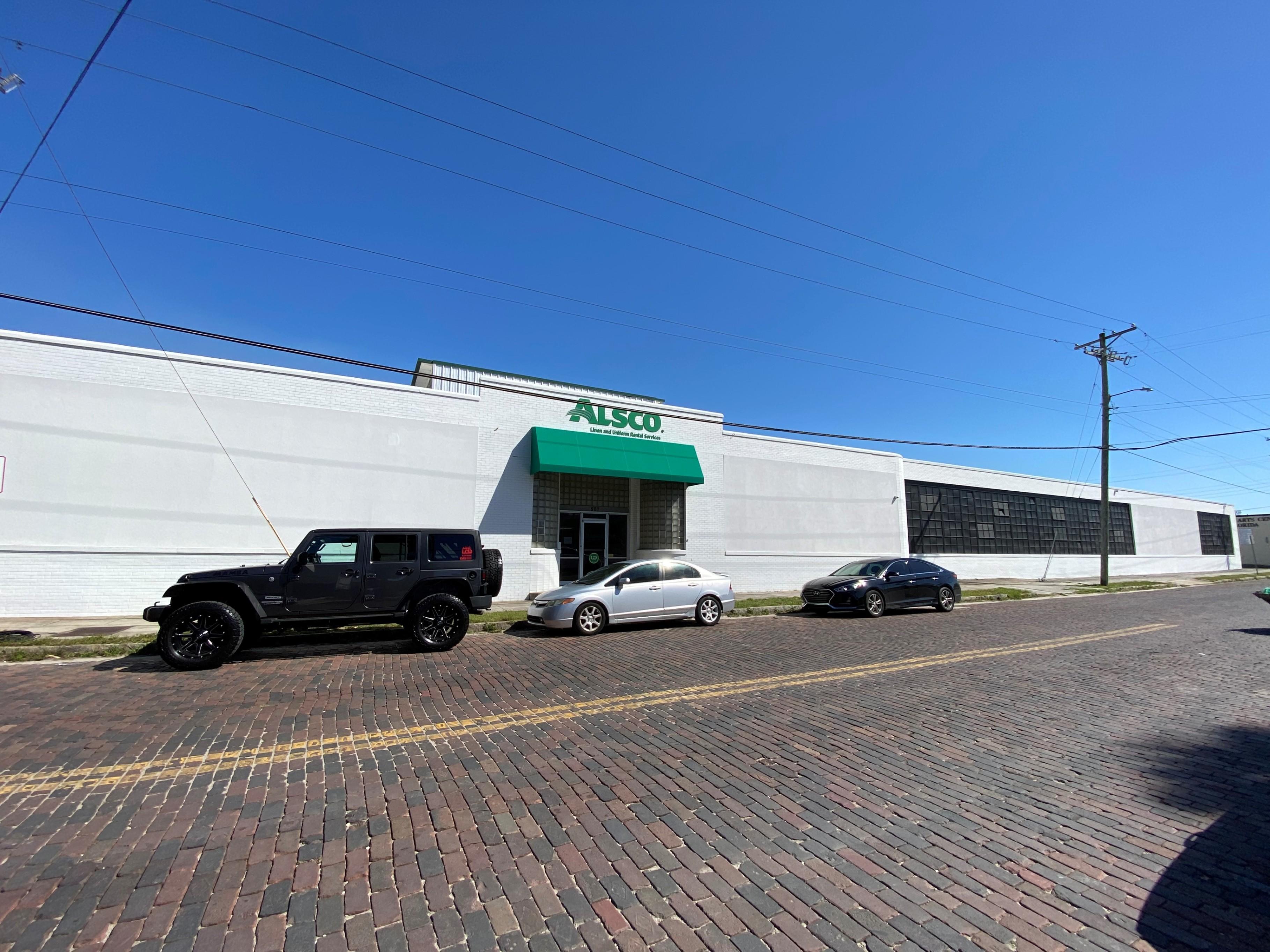 This is a photo of the exterior of the Alsco Uniforms location.